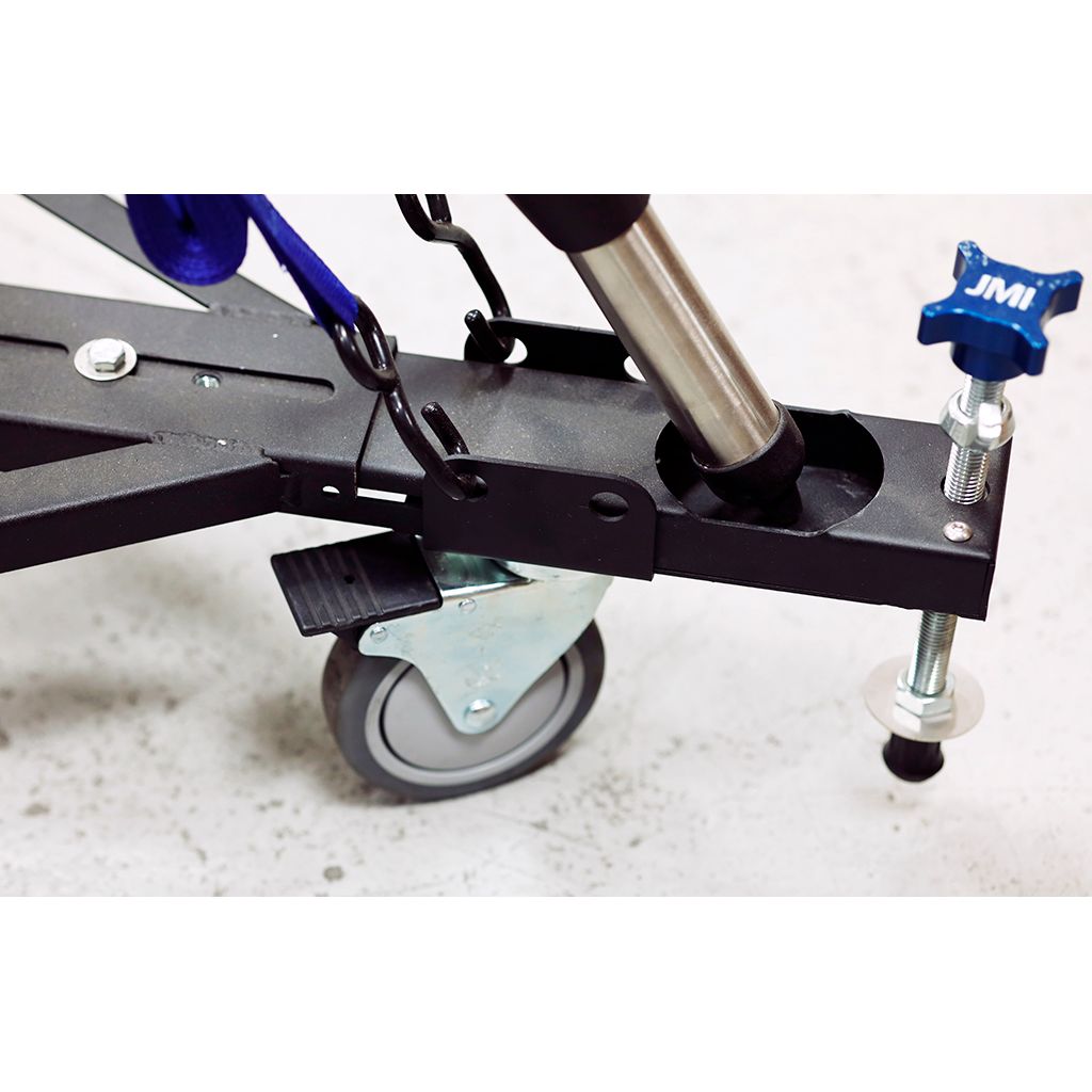 JMI Wheeley Bar Tie-Down Bracket Kit installed on HD Medium Wheeley Bar with ratchet straps securing telescope tripod legs
