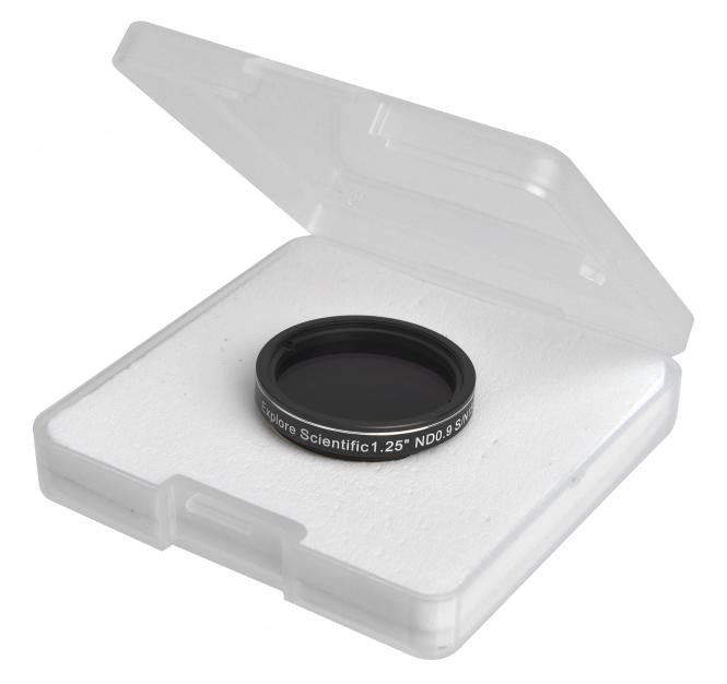 The neutral density filter standing beside its round hinged plastic storage case