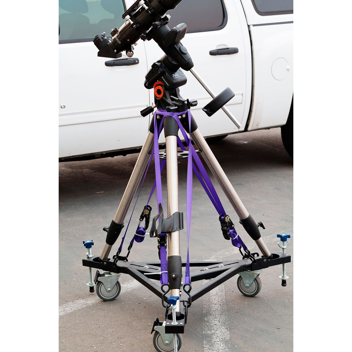 JMI Wheeley Bar Tie-Down Bracket Kit securing a complete telescope, mount and tripod to a Wheeley Bar for rolling transport