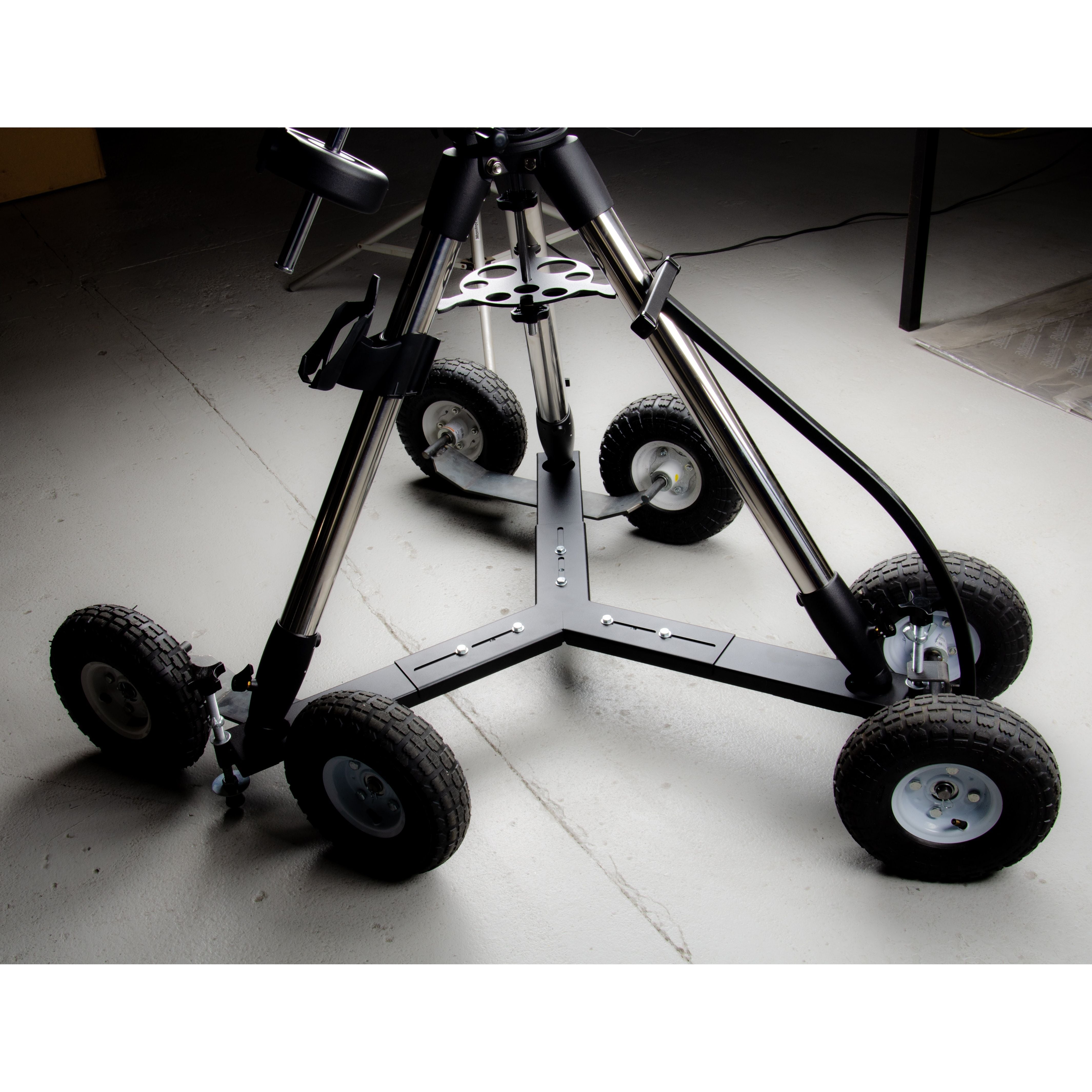 JMI HD Shorty Universal Wheeley Bar caster wheel close-up showing locking mechanism and leveling bolt